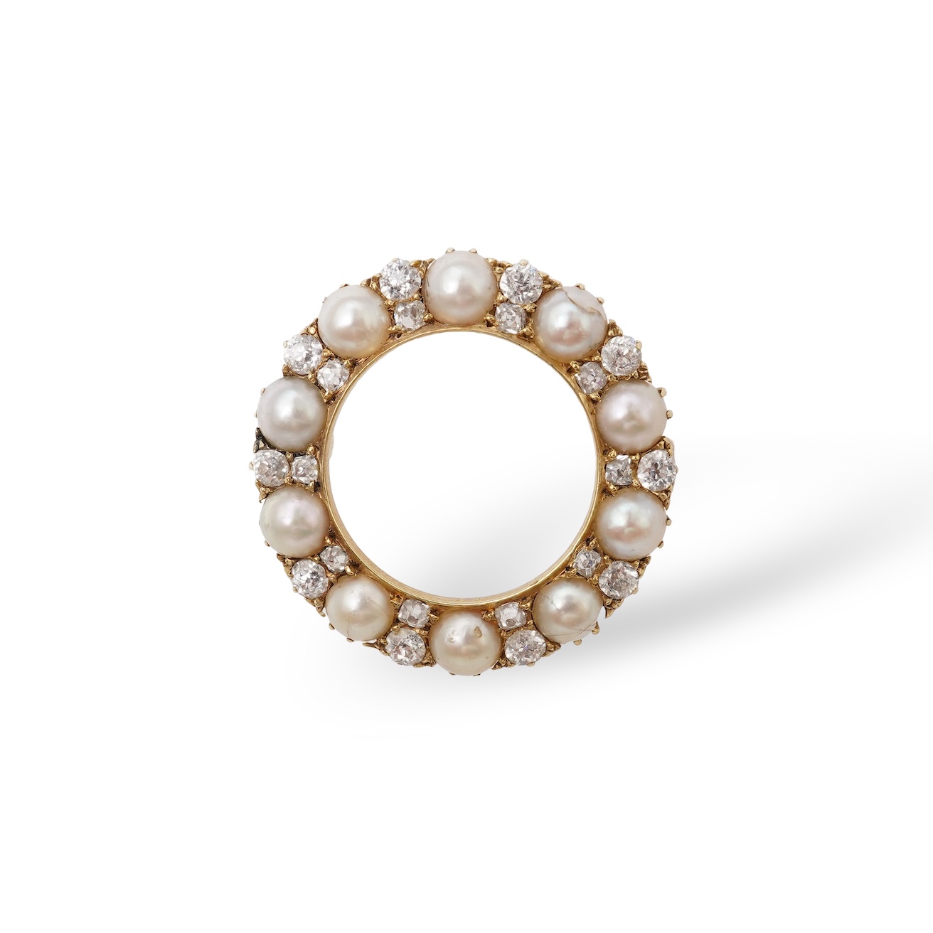 A late Victorian split pearl and diamond brooch, circa 1900